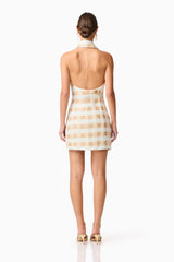 Brunette model wearing Ashlyn Halter Tweed Mini Dress in White & Gold back shot