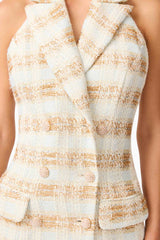 Brunette model wearing Ashlyn Halter Tweed Mini Dress in White & Gold detail shot