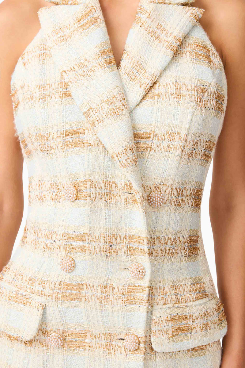 Brunette model wearing Ashlyn Halter Tweed Mini Dress in White & Gold detail shot