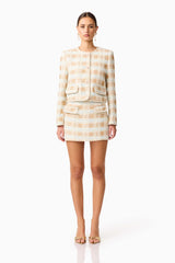 Brunette model wearing Ashlyn Long Sleeve Tweed Set in White & Gold front shot