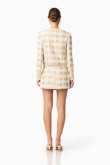 Brunette model wearing Ashlyn Long Sleeve Tweed Set in White & Gold back shot