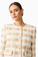 Brunette model wearing Ashlyn Long Sleeve Tweed Set in White & Gold close up shot
