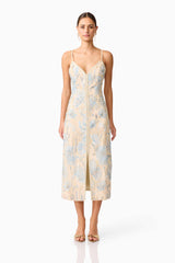 Brunette model wearing Nia Embroidered Midi Dress in Beige front shot
