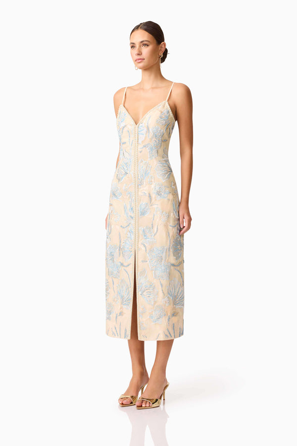 Brunette model wearing Nia Embroidered Midi Dress in Beige side shot