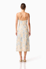 Brunette model wearing Nia Embroidered Midi Dress in Beige back shot