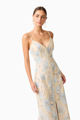 Brunette model wearing Nia Embroidered Midi Dress in Beige close up shot