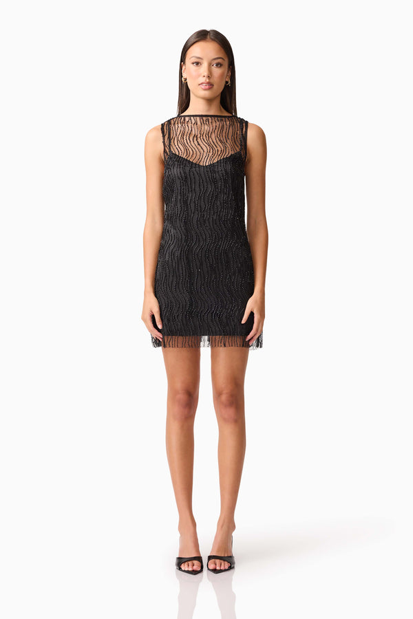 Brunette model wearing the Margot Party Shift Mini Dress in Black Front Shot