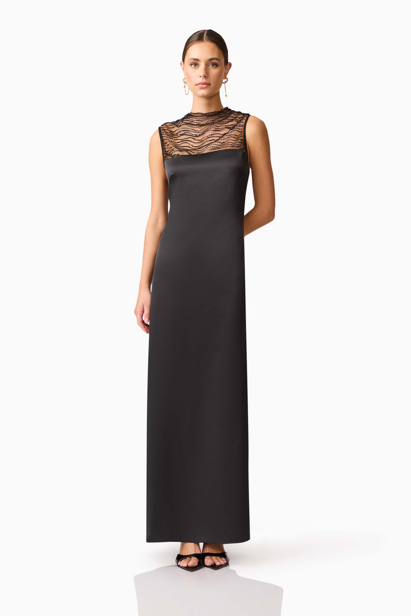 Brunette model wearing the Margot Satin Gown in Black posed shot