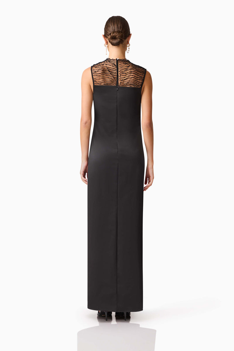 Brunette model wearing the Margot Satin Gown in Black back shot