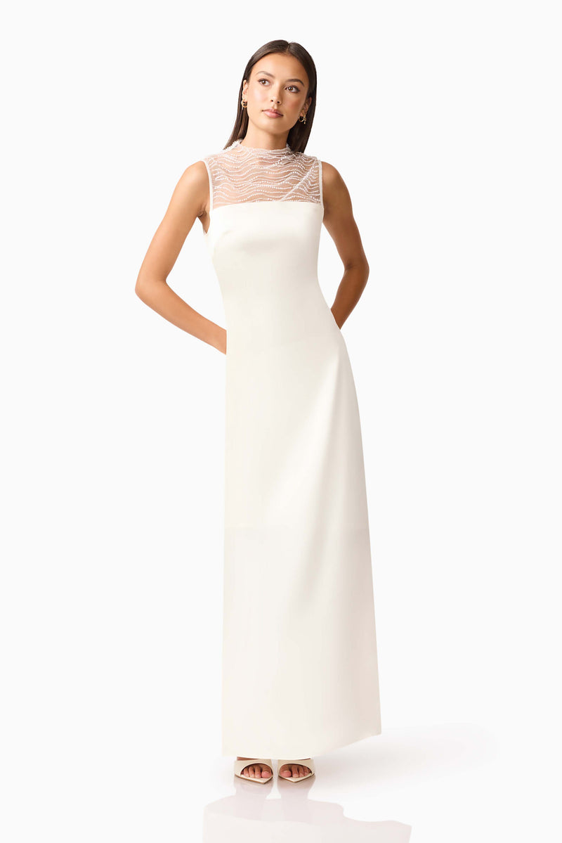 Brunette model wearing the Margot Satin Gown in White posed shot