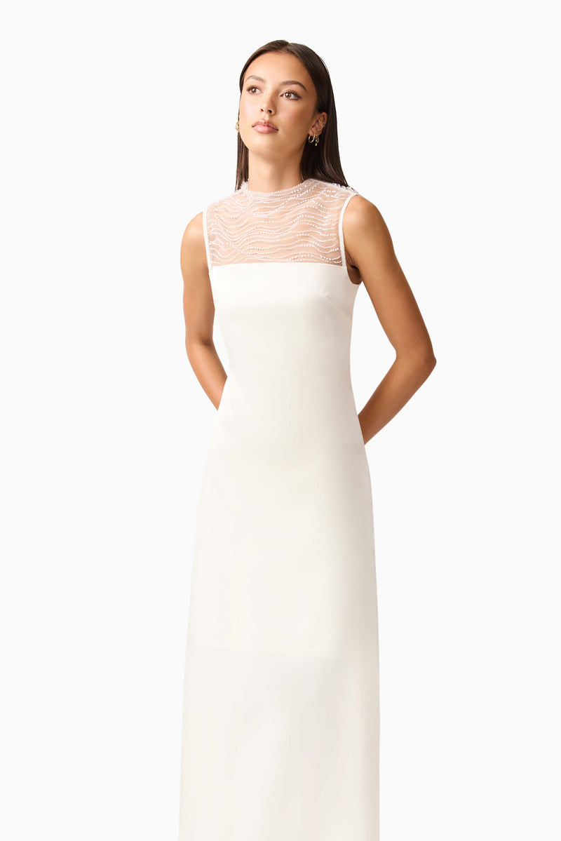 Brunette model wearing the Margot Satin Gown in White close up posed shot