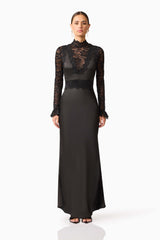 Brunette model wearing the Margot Long Sleeve Gown in Black front shot