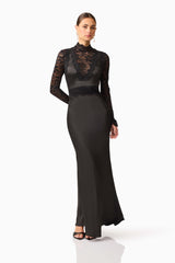 Brunette model wearing the Margot Long Sleeve Gown in Black posed shot