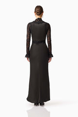 Brunette model wearing the Margot Long Sleeve Gown in Black back shot