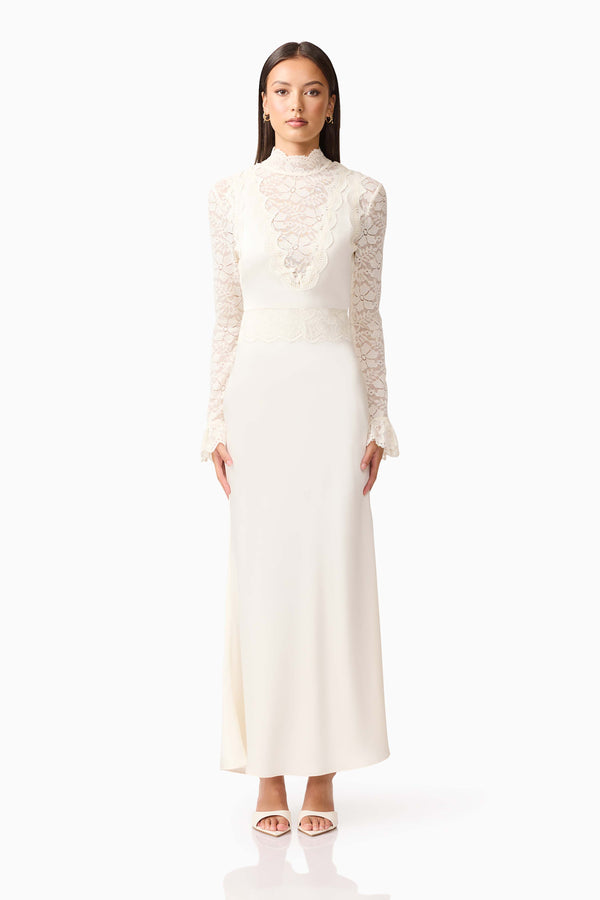 Brunette model wearing the Margot Long Sleeve Gown in White front shot