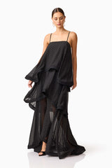 Brunette model wearing Moss Tiered Gown in Black posed shot