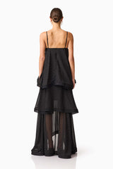 Brunette model wearing Moss Tiered Gown in Black back shot
