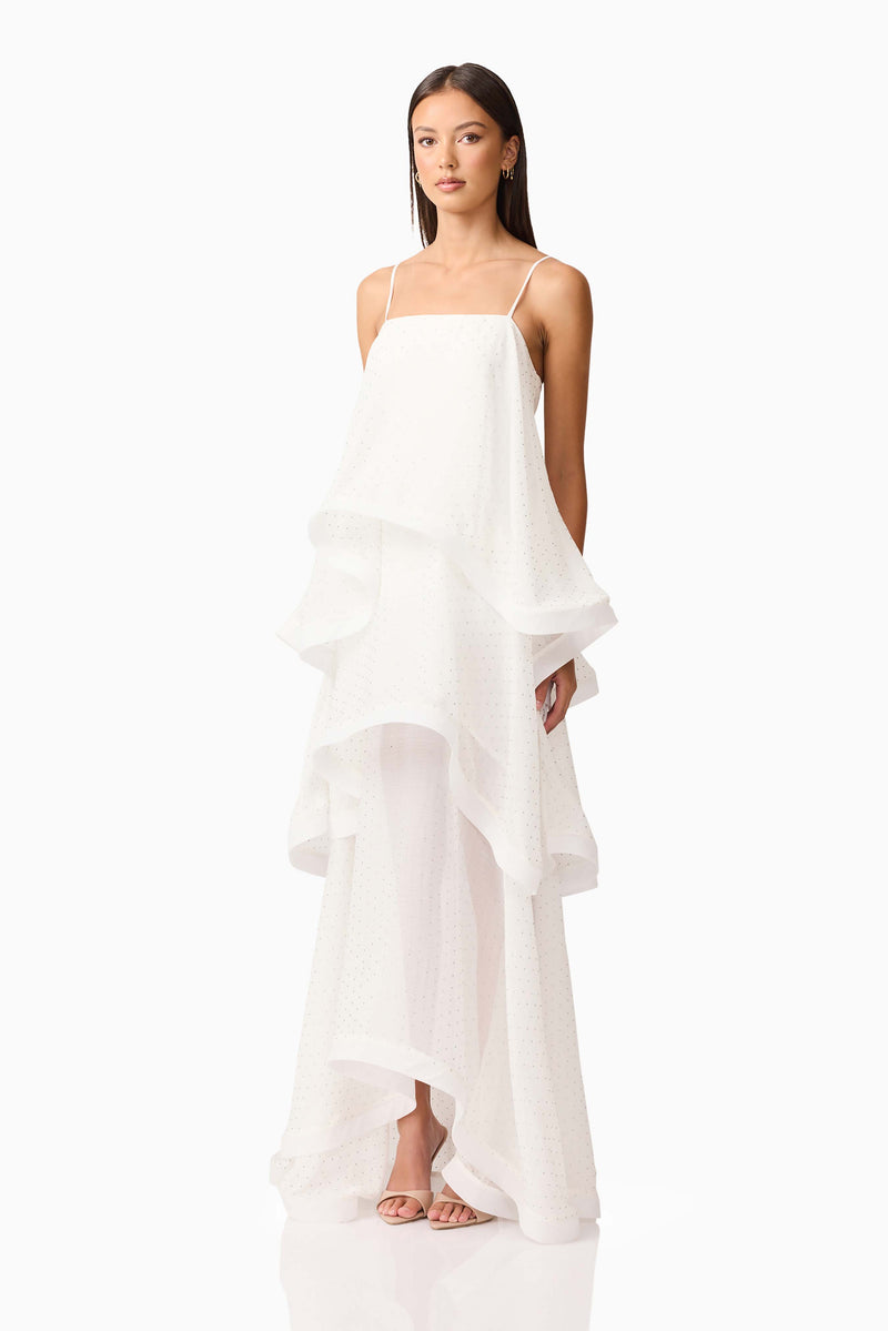 Brunette model wearing Moss Tiered Gown in White side shot