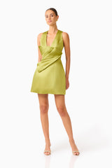 Camellin Tulip Mini Dress in Khaki Green with sleeveless details , V-shaped neckline posed shot 