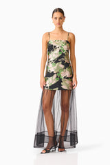 Florayne Sheer Dress in Black & Green Floral with spaghetti strap, straight neckline posed shot 