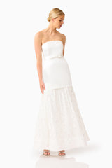 Auielle A-Line Gown in White with strapless neckline & princess seams posed looking away shot