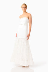 Auielle A-Line Gown in White with strapless neckline & princess seams side posed shot