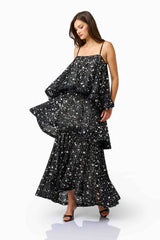 Auielle Tiered Maxi Dress in Black with square neckline & relaxed silhouette posed shot