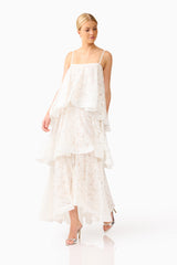Auielle Tiered Maxi Dress in White with square neckline & relaxed silhouette posed looking away shot