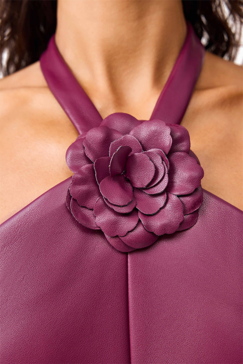 Brunette model wearing the Nova Halter Gown in Purple detail shot 