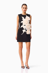 Brunette model wearing the Zahara Shift Mini Dress in Black posed shot