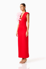 Brunette model wearing the Zahara V-Neck Gown in Red & Pink side shot