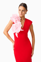 Brunette model wearing the Zahara V-Neck Gown in Red & Pink close up looking away shot