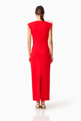 Brunette model wearing the Zahara V-Neck Gown in Red & Pink back shot