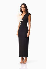 Brunette model wearing the Zahara V-Neck Gown in Black side shot