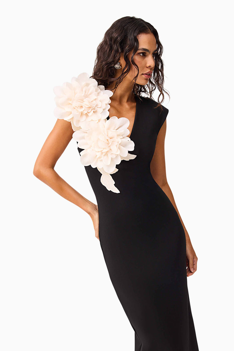 Brunette model wearing the Zahara V-Neck Gown in Black close up shot
