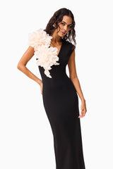 Brunette model wearing the Zahara V-Neck Gown in Black close up shot 2