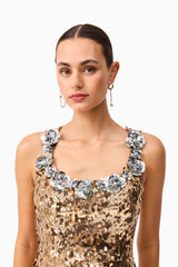 Brunette model wearing the Noelle Sequin Mini Dress in Gold close up shot 