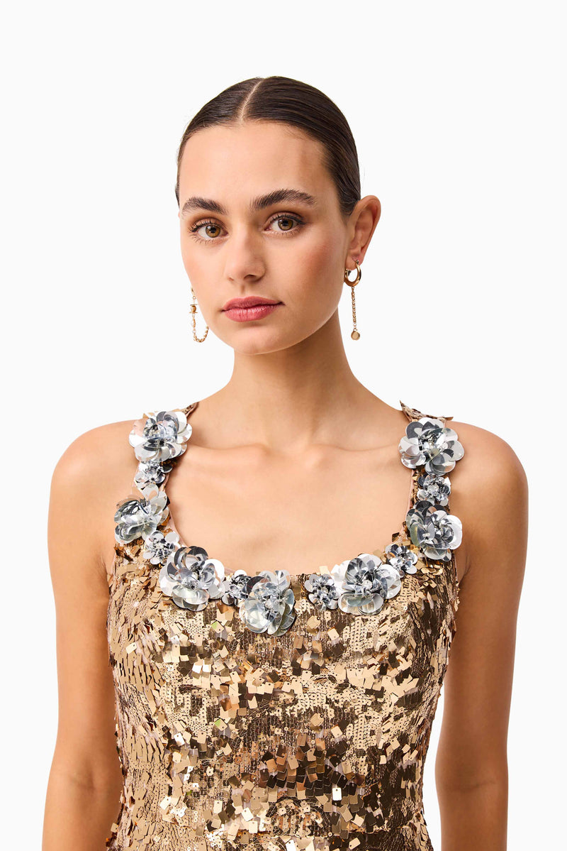 Brunette model wearing the Noelle Sequin Mini Dress in Gold close up shot 