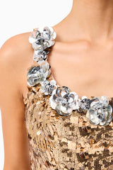 Brunette model wearing the Noelle Sequin Mini Dress in Gold detail shot