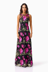 Brunette model wearing the Amaya Gown in Black & Pink Floral front shot
