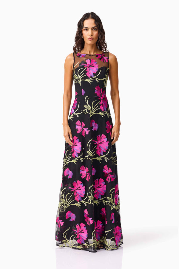 Brunette model wearing the Amaya Gown in Black & Pink Floral front shot