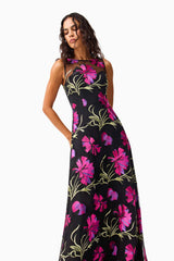 Brunette model wearing the Amaya Gown in Black & Pink Floral close up shot