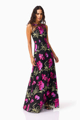 Brunette model wearing the Amaya Gown in Black & Pink Floral posed shot 2