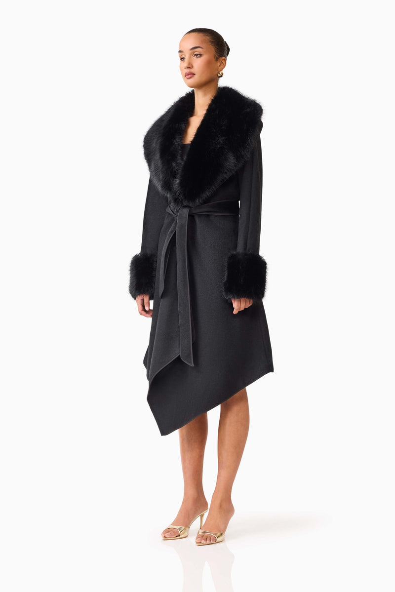 Brunette model wearing the Aria Jacket in Black side shot