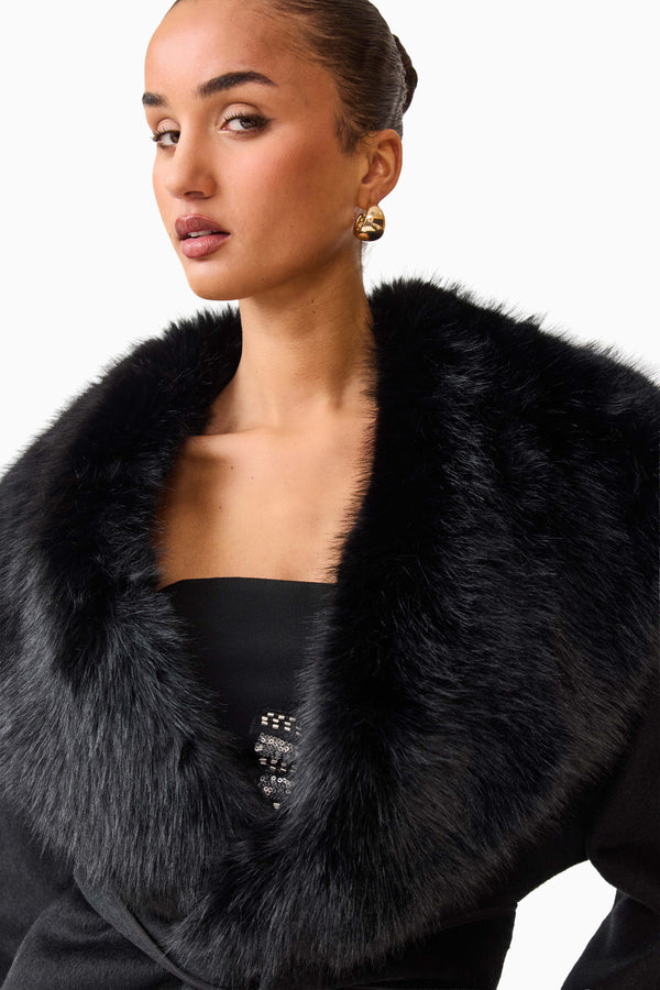 Brunette model wearing the Aria Jacket in Black close up shot
