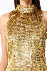 Model wearing Mercelline Embellished Mini Dress in Gold with high neckline & sequin fabrication detail shot