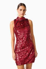 Model wearing Mercelline Embellished Mini Dress in Red with sequin fabrication & high neckline close up shot