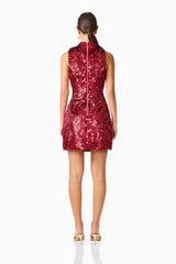 Model wearing Mercelline Embellished Mini Dress in Red with sequin fabrication & back zipper back shot