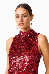Model wearing Mercelline Embellished Mini Dress in Red with sequin fabrication & high neckline close up detail shot
