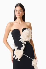 Martina Applique Midi Dress in Black with a sweetheart neckline and 3D floral detailing close up shot